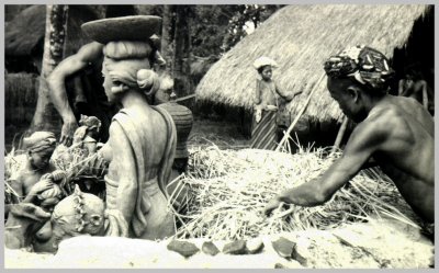 Preparing to fire terracottas in straw